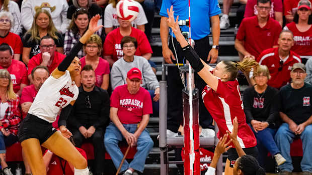 Oct 21, 2023; Lincoln, NE, USA; Wisconsin Badgers middle blocker Anna Smrek (14) attempts to block Nebraska Cornhuskers outside hitter Harper Murray (27) during the fourth set at the Bob Devaney Sports Center. Mandatory Credit: Dylan Widger-USA TODAY Sports